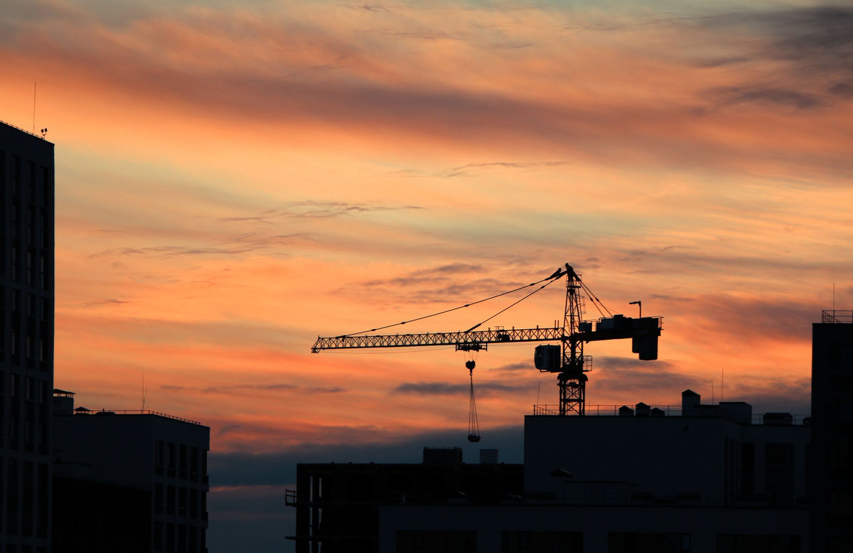 Beautiful-Shot-Silhouette-Crane-During-Sunset-Construction-Process