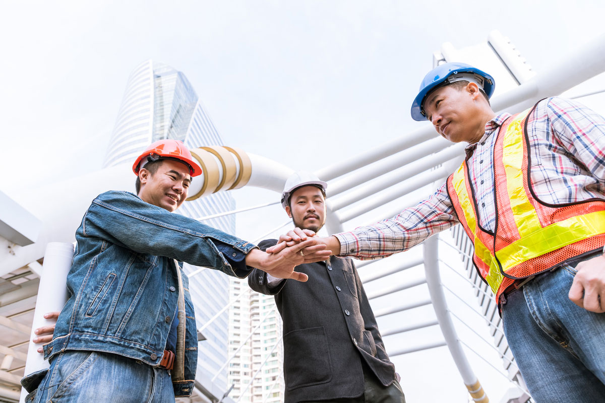 Digital-Transformation-Consulting-meeting-with-engineer-outdoor-site-stack-hand-teamwork