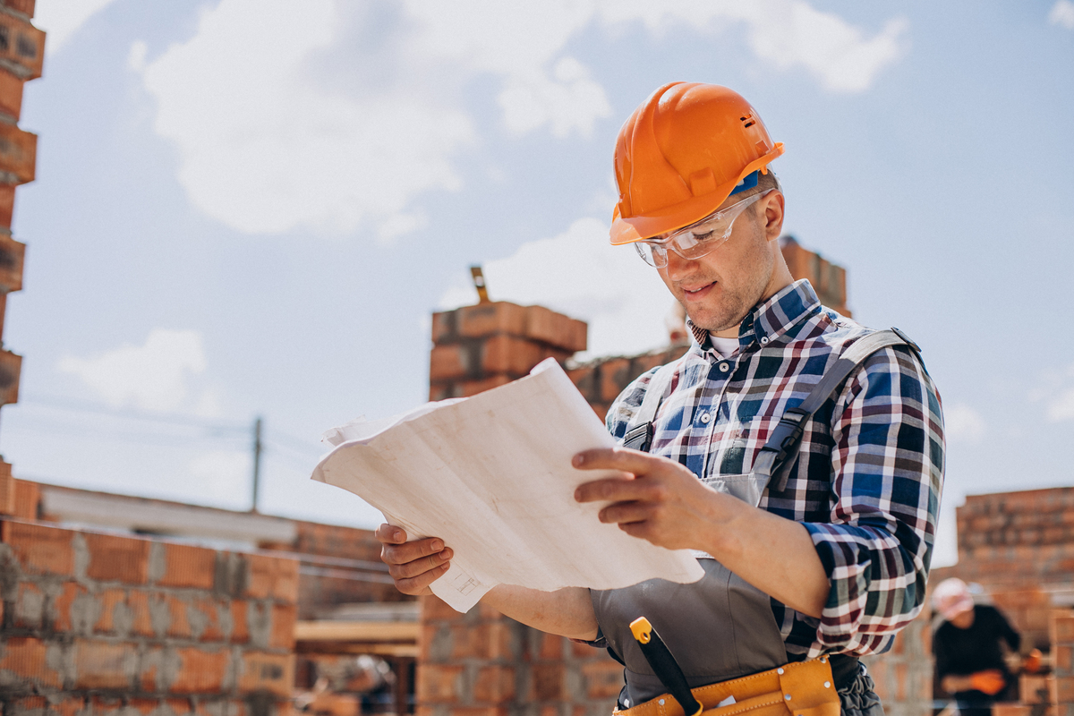 Young-Craftsman-Building-a-House-Using-Construction-Materials