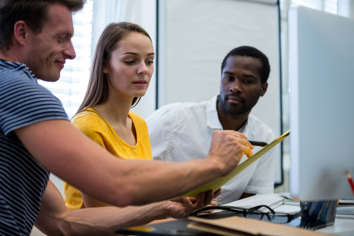 Construction-Digital-Handover-discussing-engineers-in-office