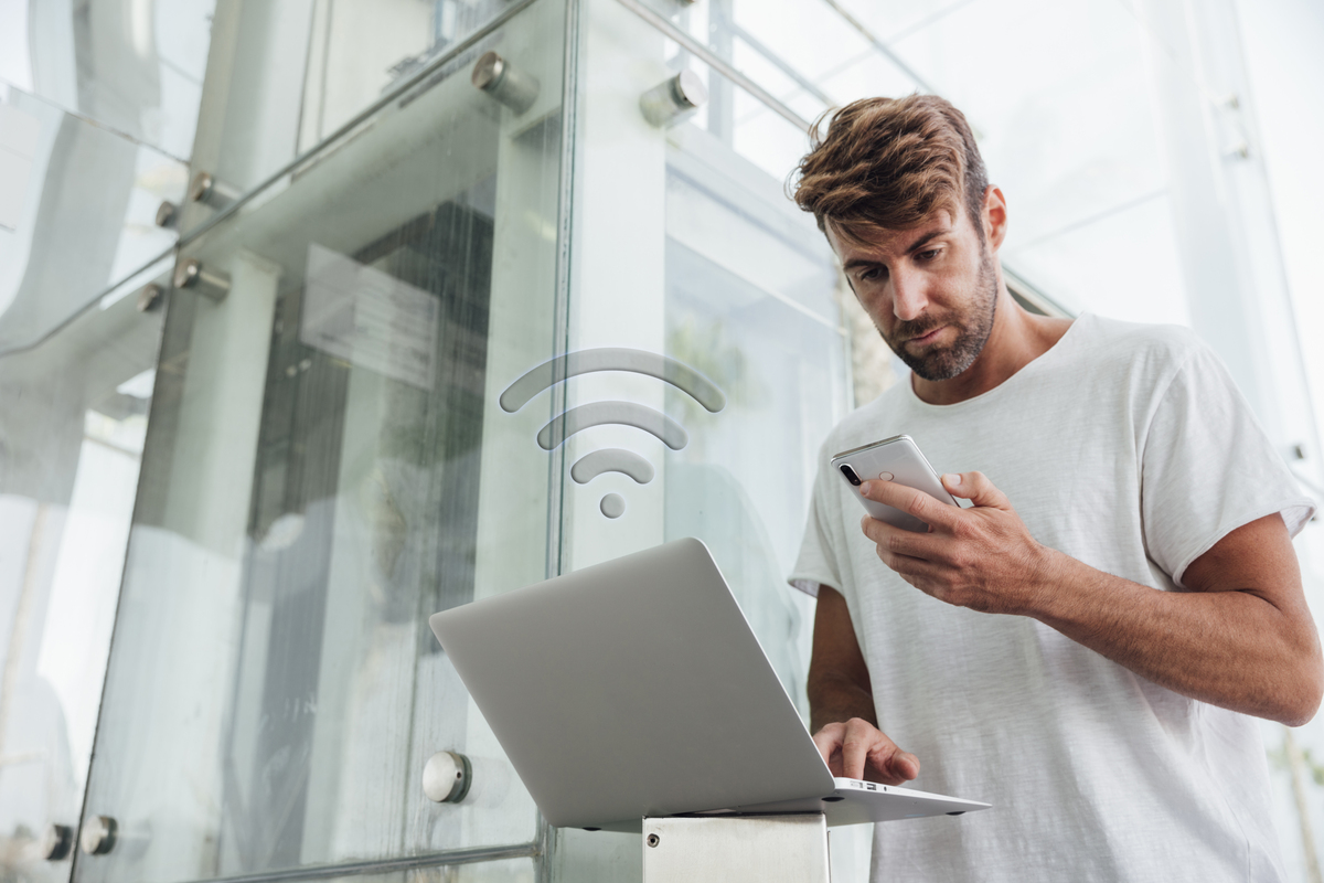 Bearded-Man-Checking-Portable-Devices-IoT-Applications