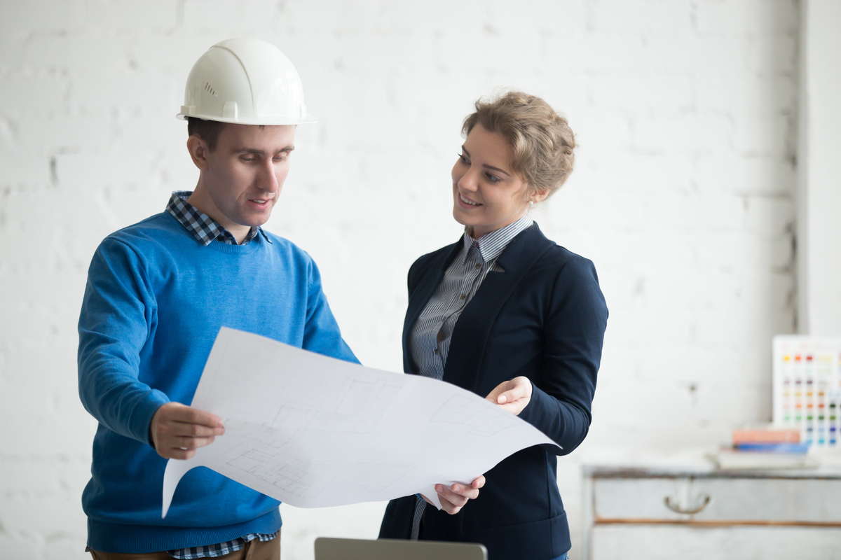 coworkers-checking-Construction-Quality-Management