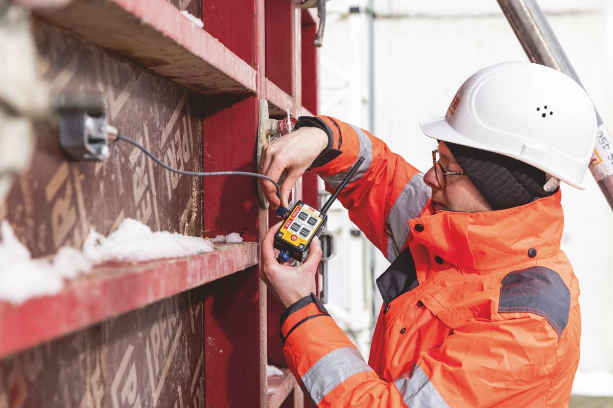 worker-installing-Types-of-Sensors-in-Construction-Industry