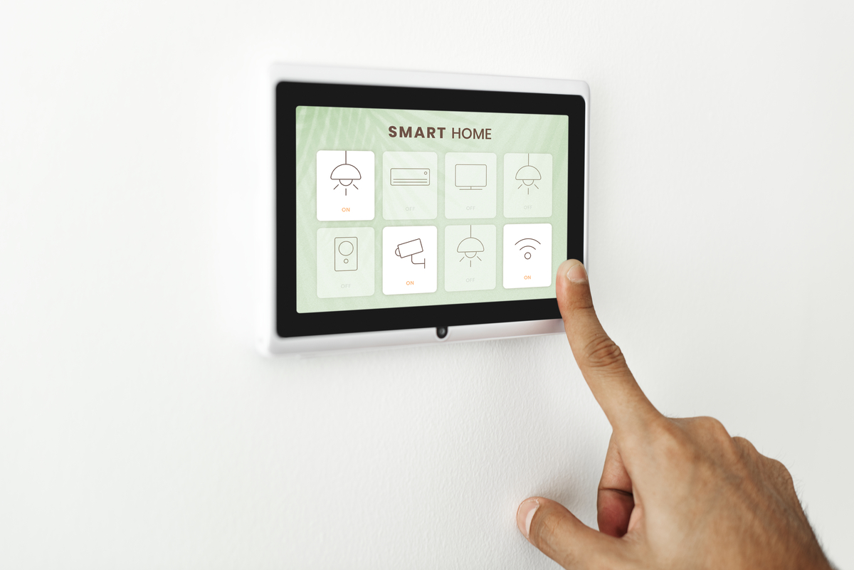 finger-pressing-smart-home-automation-panel-monitor-Building-Sensors