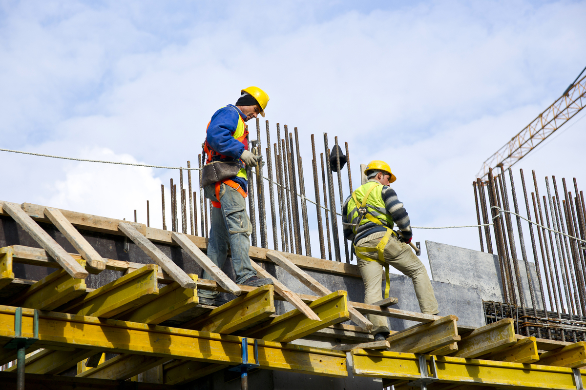 Construction-Company-in-India-workers-examining-work