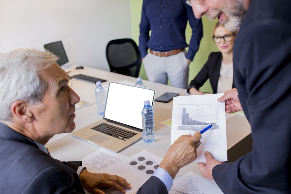 business-people-discussing-during-meeting-Change-Management-Principles